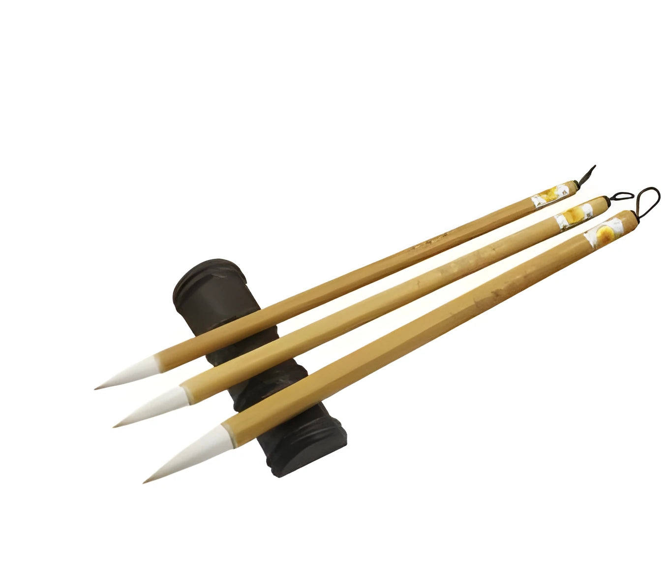 Three traditional Chinese writing brushes with woolen bristles and bamboo handles in large, medium, small sizes