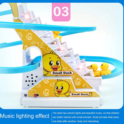 Little Duck Climbing Stairs Toy showing three yellow ducks on rotating slide with colourful LED lights