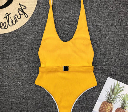 Women's one-piece swimsuit in solid colour polyester with belt buckle, tight fit, available in six colours and sizes S M L