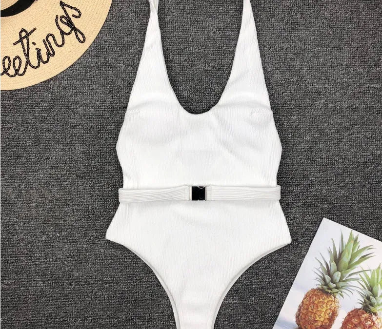 Women's one-piece swimsuit in solid colour polyester with belt buckle, tight fit, available in six colours and sizes S M L