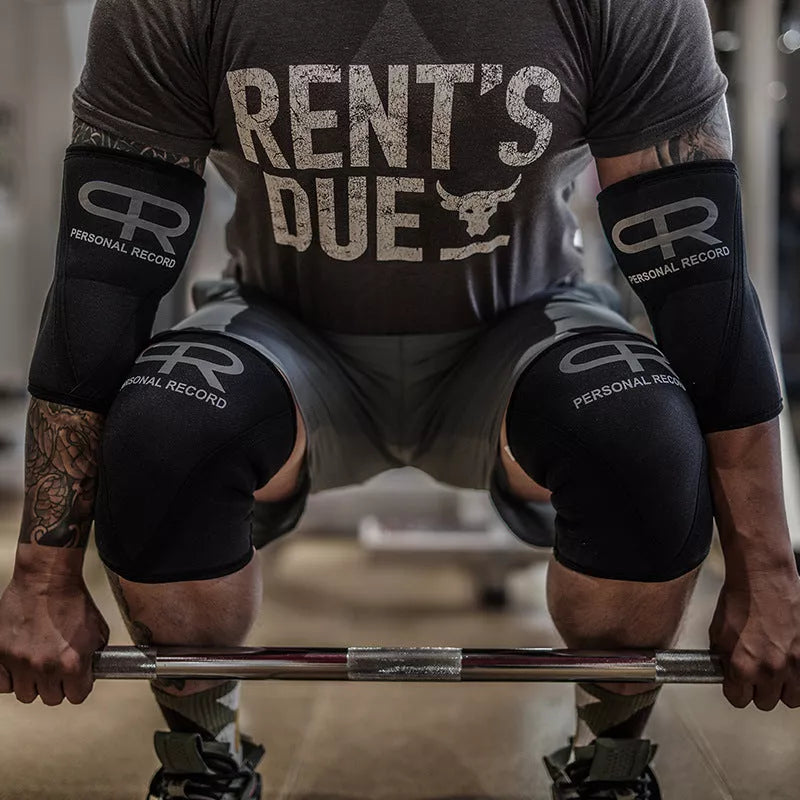 Professional black weightlifting knee pads for squats, available in sizes S to XL.