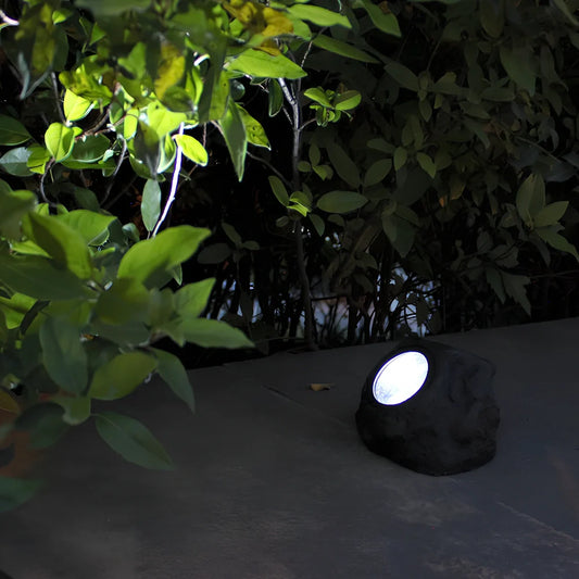 Solar courtyard lamp with simulation stone design and LED illumination for outdoor gardens