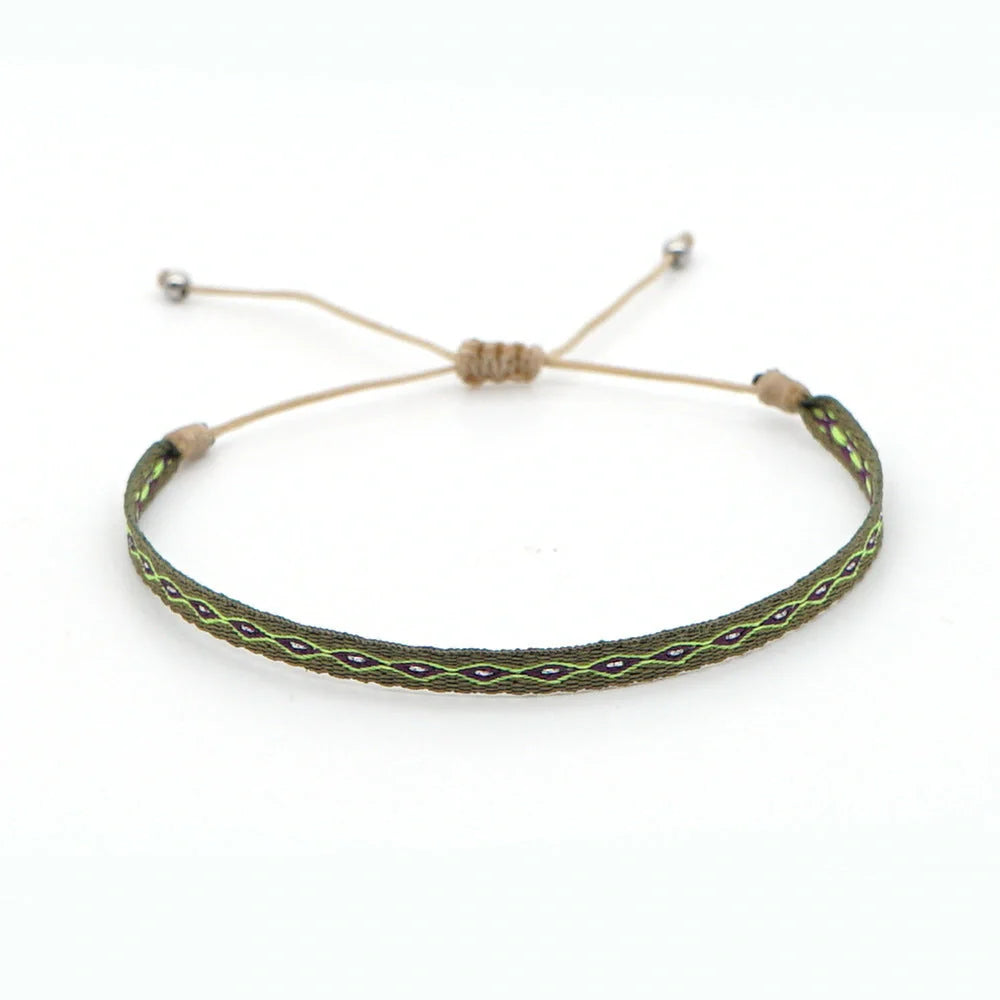 Elegant bohemian-inspired handcrafted bracelet with intricate webbing design, showcasing Spanish vintage and Nepalese ethnic influences