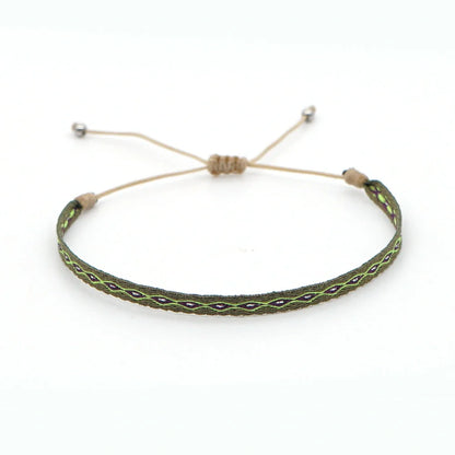 Elegant bohemian-inspired handcrafted bracelet with intricate webbing design, showcasing Spanish vintage and Nepalese ethnic influences