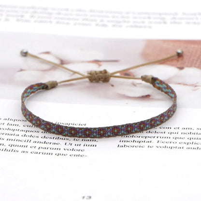 Elegant bohemian-inspired handcrafted bracelet with intricate webbing design, showcasing Spanish vintage and Nepalese ethnic influences