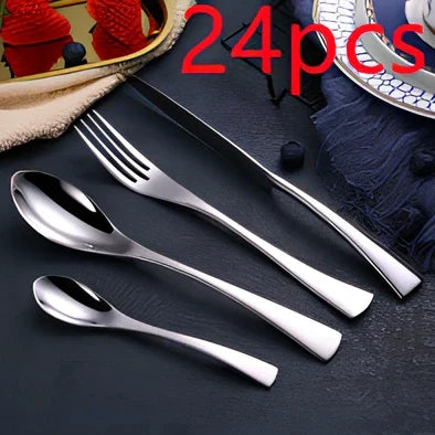 Four-piece black stainless steel cutlery set with mirror polishing showing fork, knife, coffee spoon, and soup spoon