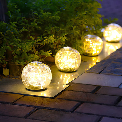 Cracked glass ball LED solar light, 10cm size with warm white glow for garden paths, waterproof and ground stake included