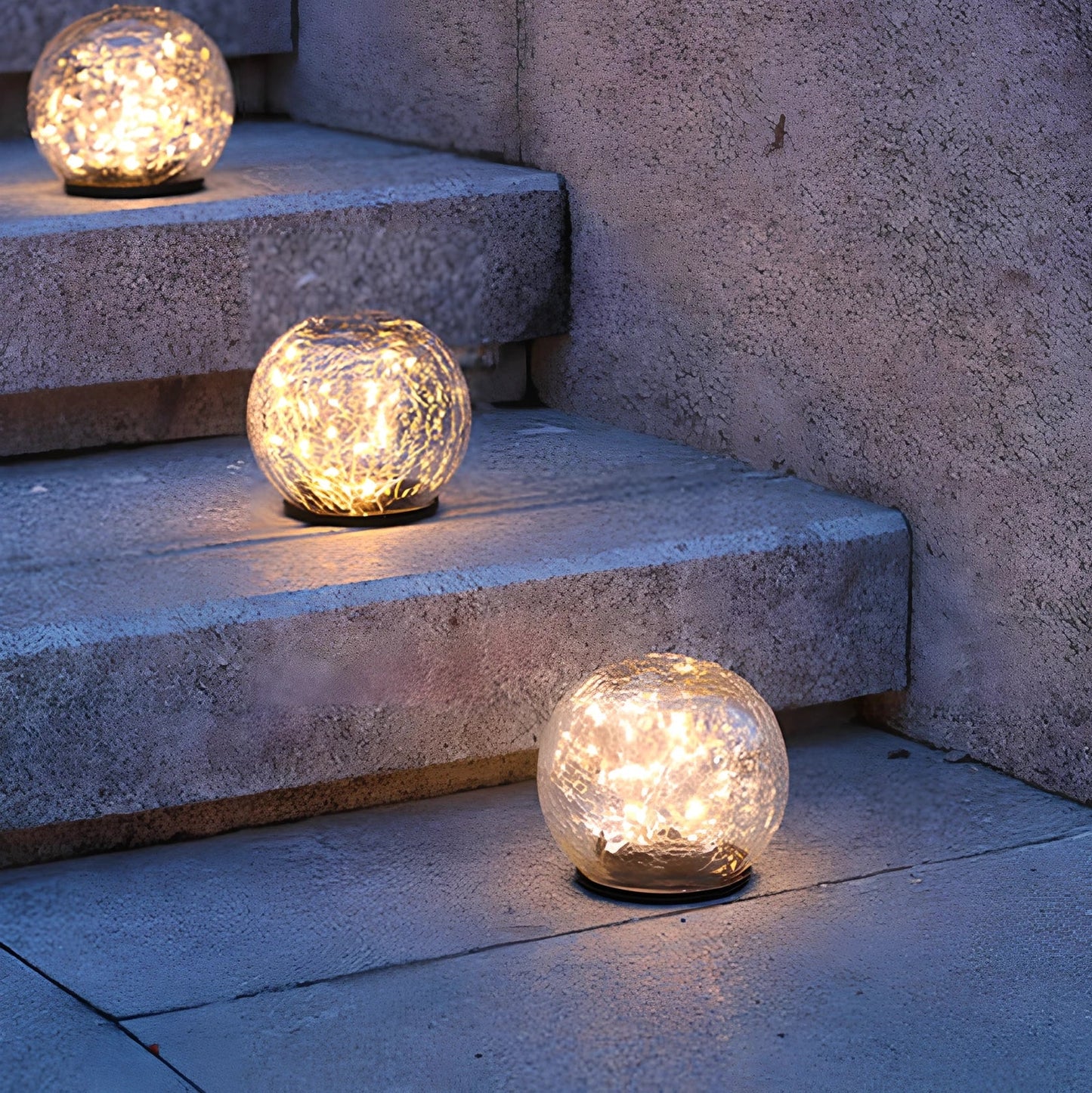 Cracked glass ball LED solar light, 10cm size with warm white glow for garden paths, waterproof and ground stake included