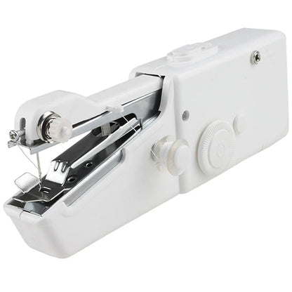 Black handheld electric sewing machine with ruler, scissors, and thread coils on white background