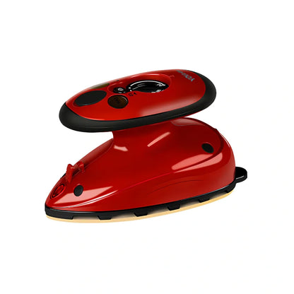 Red mini electric travel iron with ceramic soleplate showing temperature dial and compact design