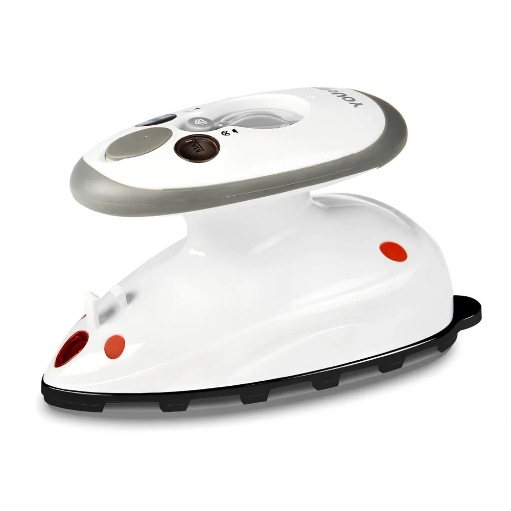 Red mini electric travel iron with ceramic soleplate showing temperature dial and compact design