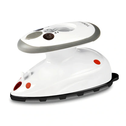 Red mini electric travel iron with ceramic soleplate showing temperature dial and compact design