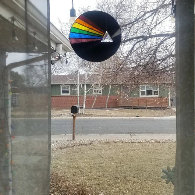 Mesmerizing abstract Moon-themed wall art in round and oval shapes, made of premium acrylic materials for a captivating living room decor piece.