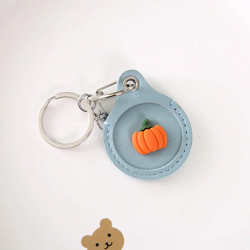 Fruit-themed silicone protective case for Apple AirTag with keychain