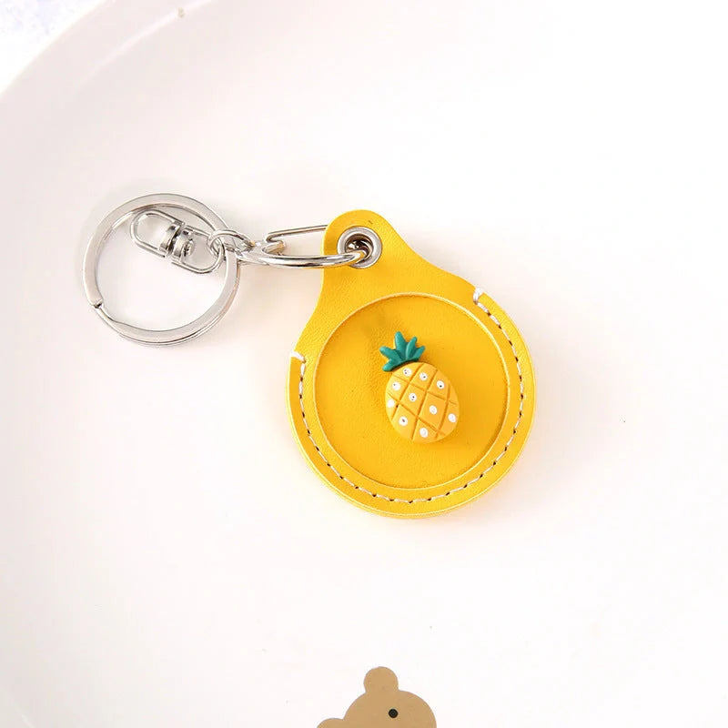 Fruit-themed silicone protective case for Apple AirTag with keychain