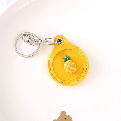 Fruit-themed silicone protective case for Apple AirTag with keychain