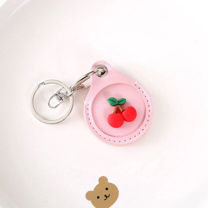 Fruit-themed silicone protective case for Apple AirTag with keychain