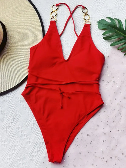 Women's solid colour one-piece swimsuit with chest padding in red or black options