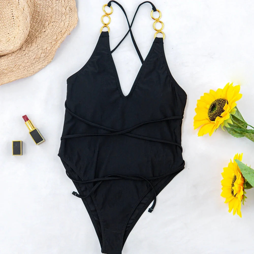 Women's solid colour one-piece swimsuit with chest padding in red or black options