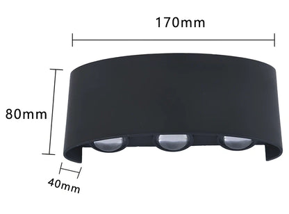 Black outdoor LED wall lamp with aluminium shell mounted on a wall, showing compact design and rainproof IP65 rating