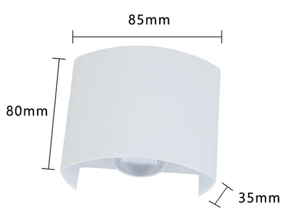 Black outdoor LED wall lamp with aluminium shell mounted on a wall, showing compact design and rainproof IP65 rating