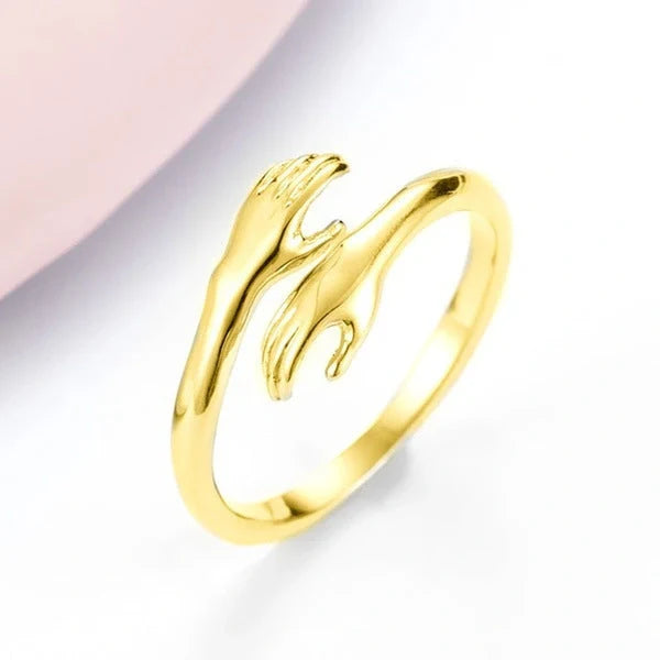 Adjustable Alloy Hands Hug Ring in gold and silver, featuring a unique geometry design