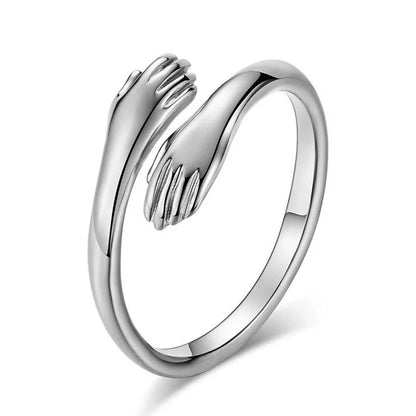 Adjustable Alloy Hands Hug Ring in gold and silver, featuring a unique geometry design
