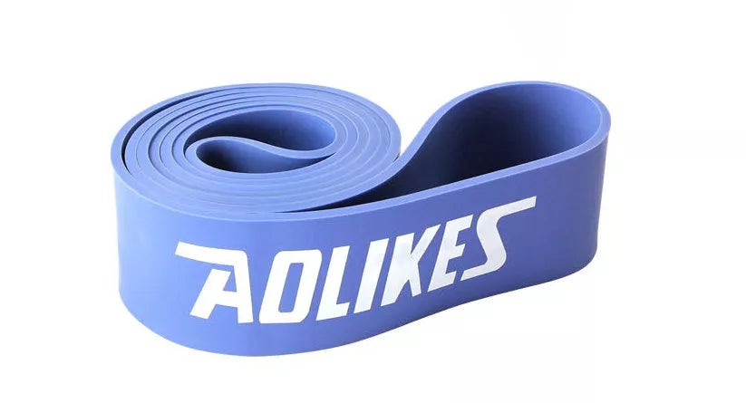 Natural latex resistance band for yoga and fitness training in various resistance levels.