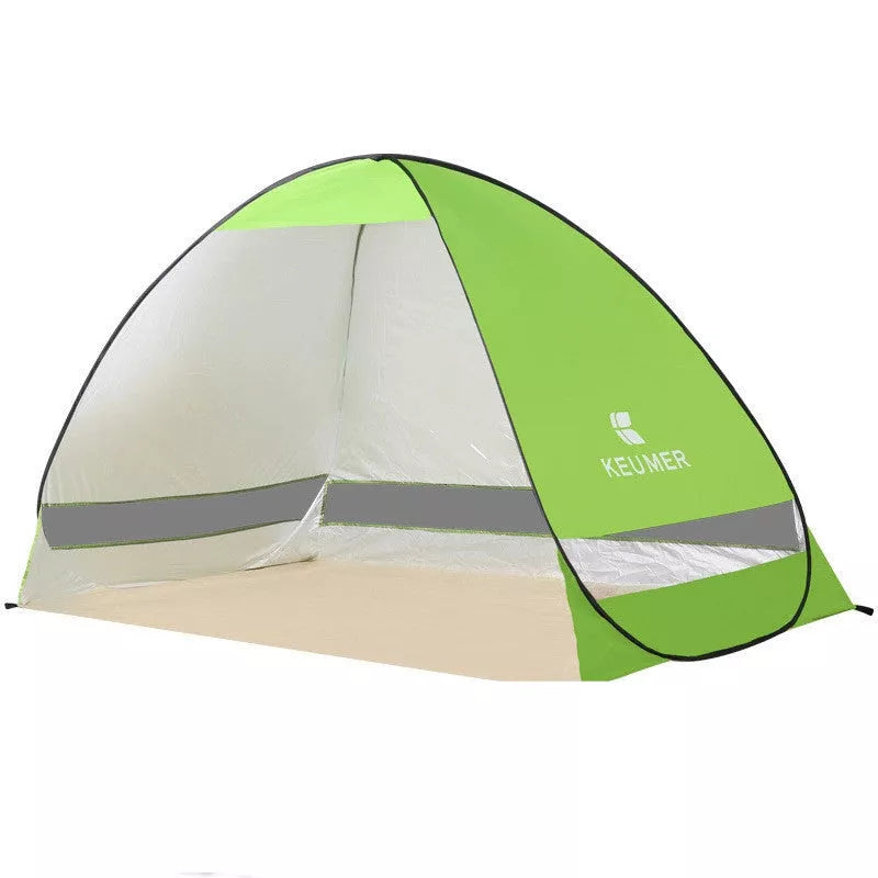 Ultra-light portable folding beach tent in royal blue with quick setup feature