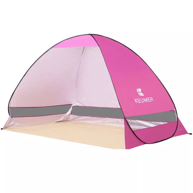 Ultra-light portable folding beach tent in royal blue with quick setup feature