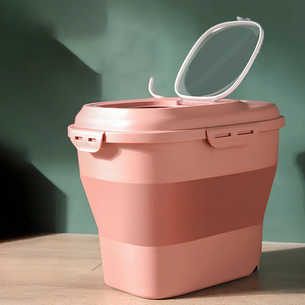 Green 16-litre pet food storage bucket with airtight seal and integrated measuring scoop