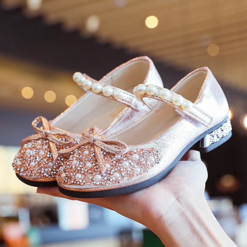 Children's leather shoes with rhinestone details and Velcro fastening in black, pink, and silver colours