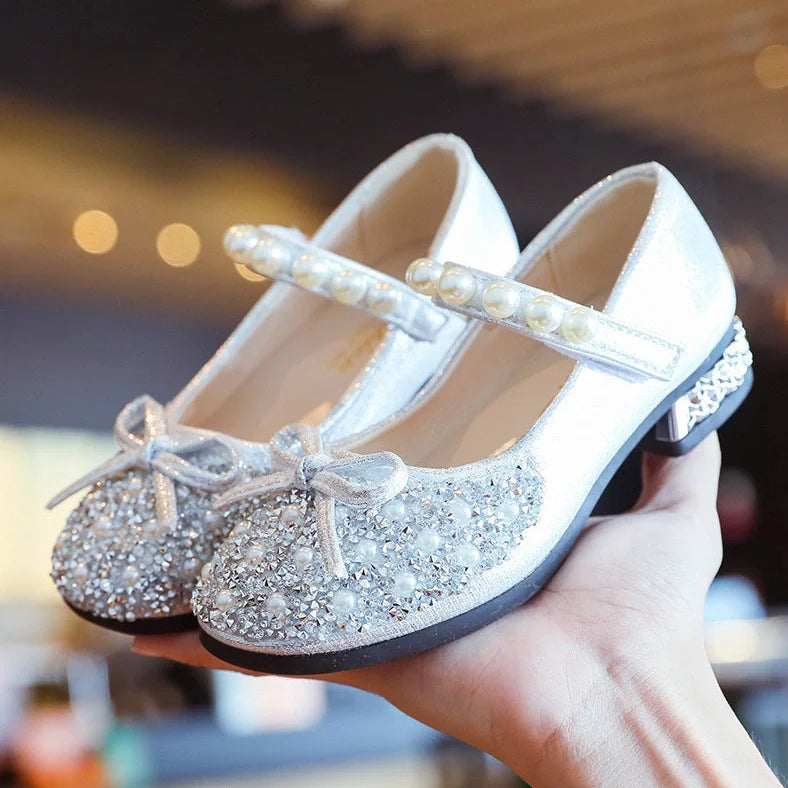 Children's leather shoes with rhinestone details and Velcro fastening in black, pink, and silver colours