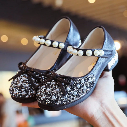 Children's leather shoes with rhinestone details and Velcro fastening in black, pink, and silver colours