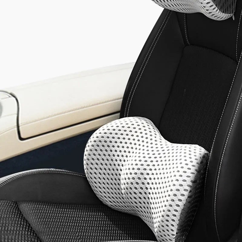 Memory foam car headrest and lumbar support set with polyurethane cover and solid colour stitching in blue, green, grey or black.