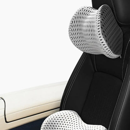 Memory foam car headrest and lumbar support set with polyurethane cover and solid colour stitching in blue, green, grey or black.