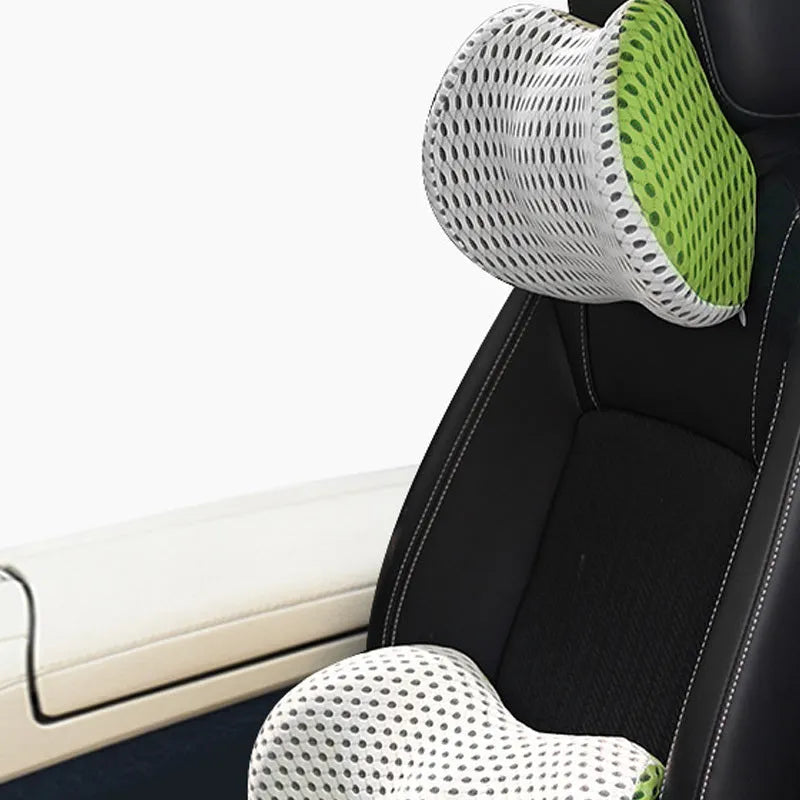 Memory foam car headrest and lumbar support set with polyurethane cover and solid colour stitching in blue, green, grey or black.