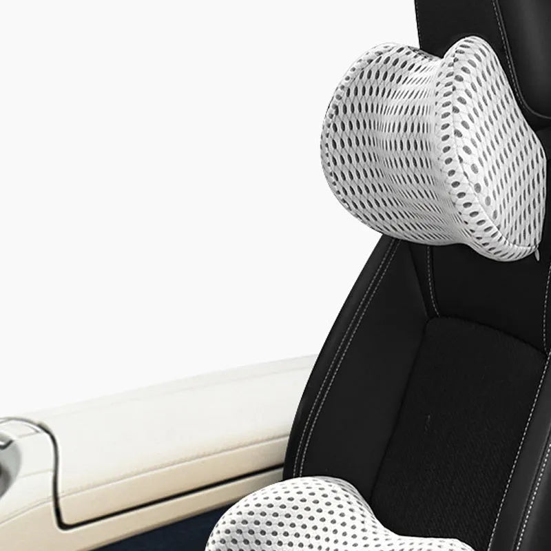 Memory foam car headrest and lumbar support set with polyurethane cover and solid colour stitching in blue, green, grey or black.