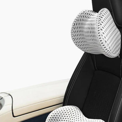 Memory foam car headrest and lumbar support set with polyurethane cover and solid colour stitching in blue, green, grey or black.