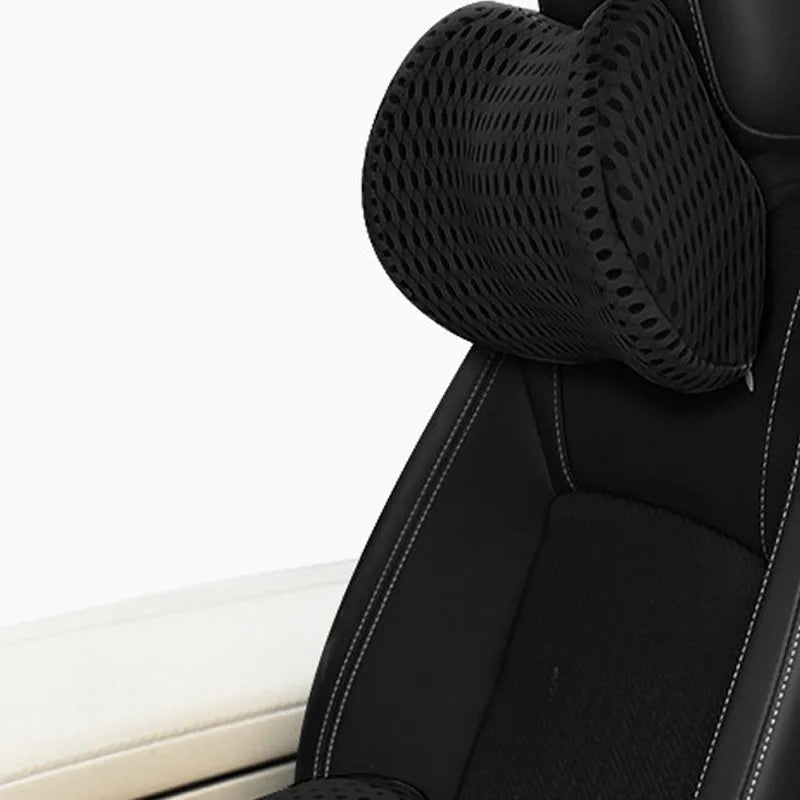 Memory foam car headrest and lumbar support set with polyurethane cover and solid colour stitching in blue, green, grey or black.