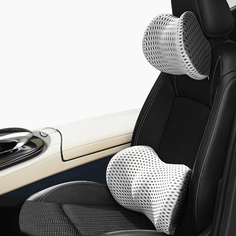 Memory foam car headrest and lumbar support set with polyurethane cover and solid colour stitching in blue, green, grey or black.