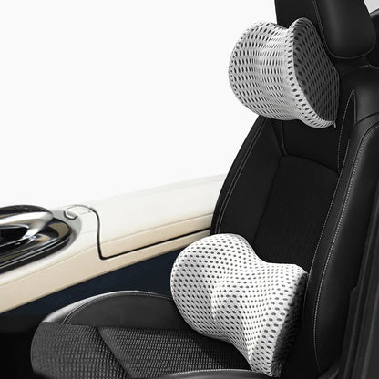 Memory foam car headrest and lumbar support set with polyurethane cover and solid colour stitching in blue, green, grey or black.