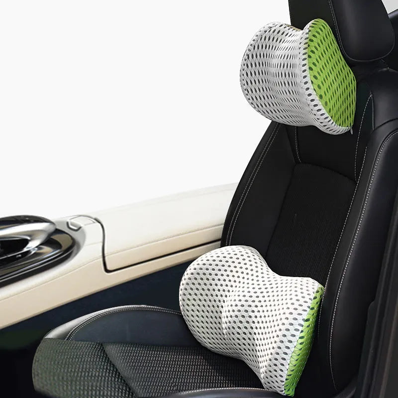 Memory foam car headrest and lumbar support set with polyurethane cover and solid colour stitching in blue, green, grey or black.