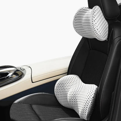 Memory foam car headrest and lumbar support set with polyurethane cover and solid colour stitching in blue, green, grey or black.