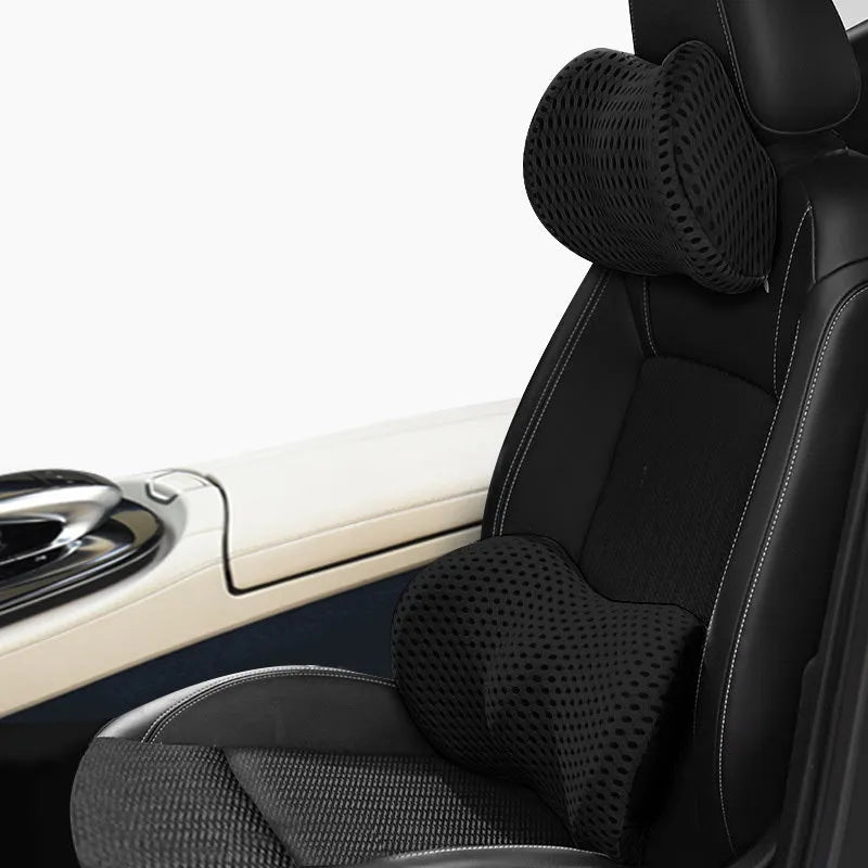 Memory foam car headrest and lumbar support set with polyurethane cover and solid colour stitching in blue, green, grey or black.