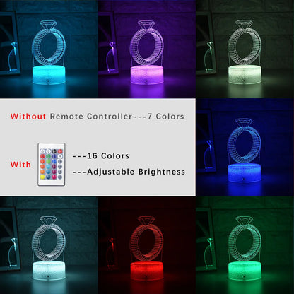 3D LED night light showing diamond ring projection with colour-changing lights on a black base