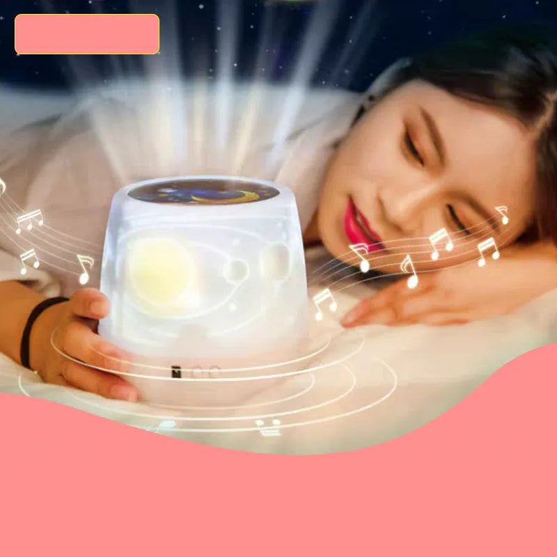 Pruixin PRX1363 projector night light showing rotating star patterns on a wall in a bedroom setting