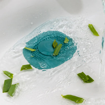 TPR vortex design sink drain cover in twilight orange, quiet blue, mango yellow, and gentian green