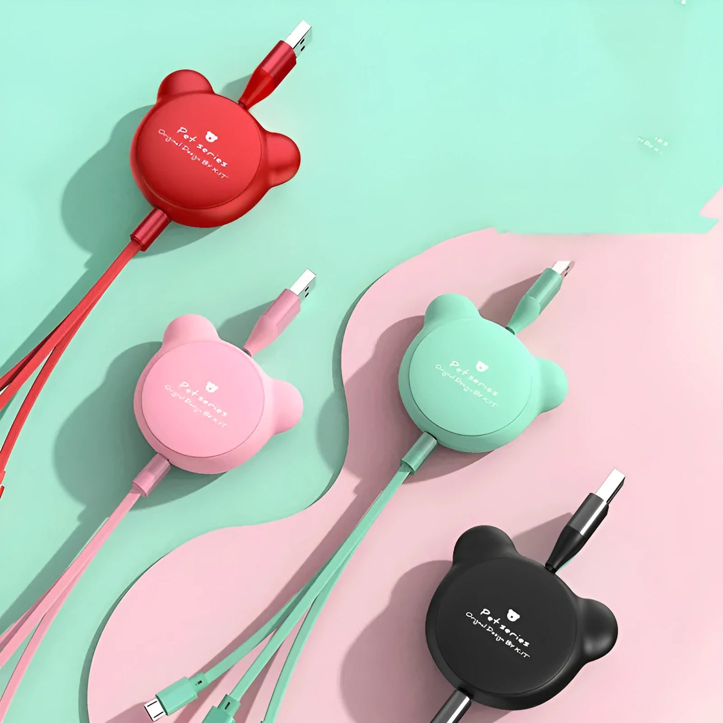 Cute telescopic bear cable organiser showing Mini USB, 30PIN, and Micro USB connectors on a 1.2m cord