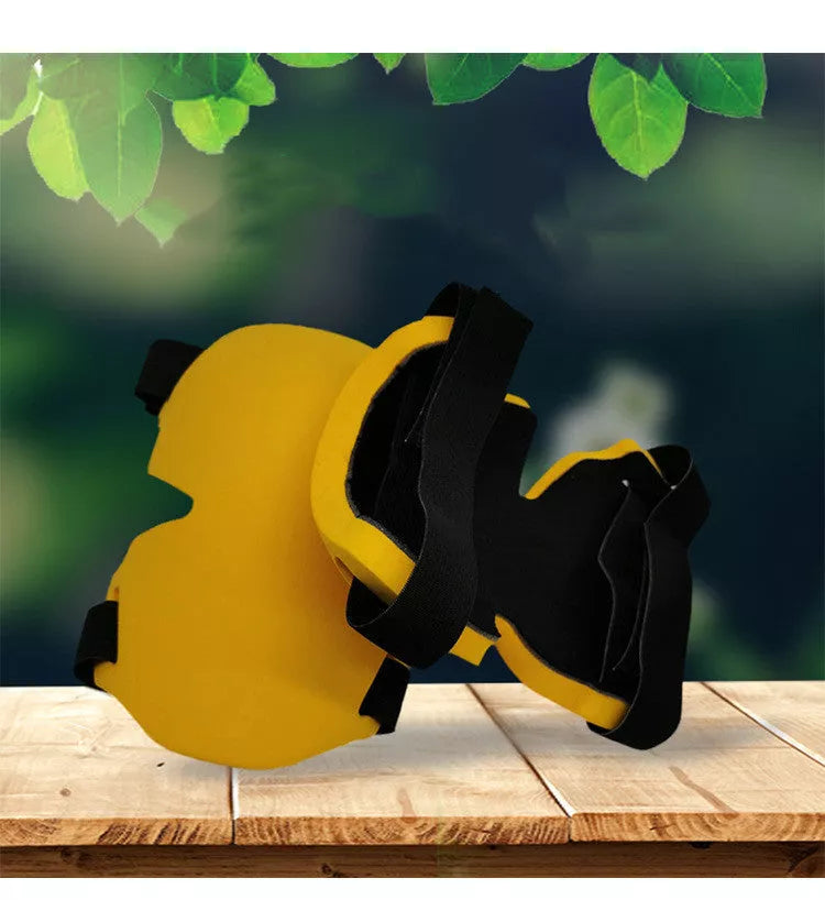 Black and yellow sports knee pads for outdoor and construction use